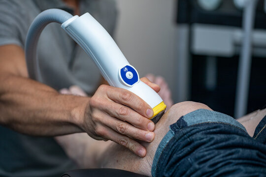 close up of a person holding ultrasound
