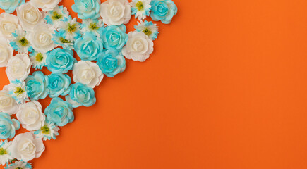Blue and White Bed Flowers with orange copy space background