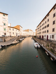 Waterway in the middle of the buildings.