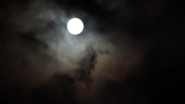 4K Moon Rises by Clouds in Night, Halloween, Full Moonlight in Cloudy Evening
