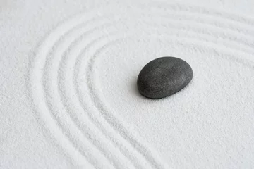 Selbstklebende Fototapeten Zen Steine Zen Graden with Grey Stone on White Sand Line Texture Background, Top View Black Rock Sea Stone on Sand Wave Parallel Lines Pattern in Japanese stye, Banner for Harmony,Meditation,Zen like concept  © Anchalee