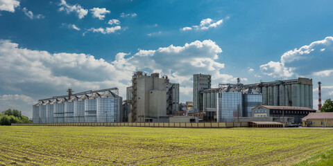 agro silos on agro-industrial complex and grain drying and seeds cleaning line.