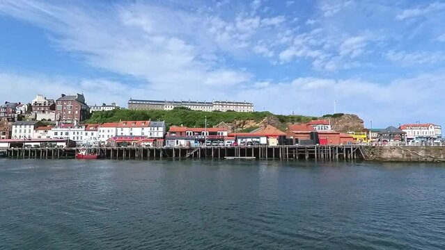 The River Esk and Whitby harbour on the North Yorkshire Coast. Captured from Fish Pier on a bright and sunny summer day