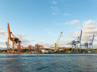 Transport and Freight Logistics Loading Port on a sunny day.