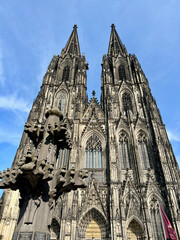 Fototapeta premium Cologne Cathedral. Roman Catholic cathedral church, located in the city of Cologne, Germany. It is the largest Gothic church in northern Europe and features immense twin towers.