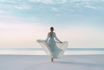 Fototapeta na wymiar Young woman in turqoise dress running on beach in sunrise. Generative AI