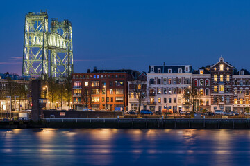 The north island quay in Rotterdam  with the old railway bridge at night