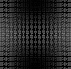 Seamless surface pattern design with ethnic ornament. Repeated white ornamental shapes composition on black background. Embroidery motif. Cultural art wallpaper. Paper for print. Modern sign ornaments