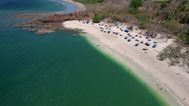 Aerial Drone Flight Zoom Out Of Conchal Beach Costa Rica To Show Mountain View, 4K