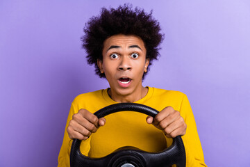 Photo of funny young driver guy hold his automobile steering wheel see car crash in front of him...