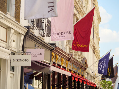 London, UK - May 24, 2023: Upmarket shop signs on Bond Street in the West End