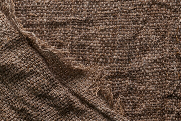 Linen crumpled texture natural fabric background closeup