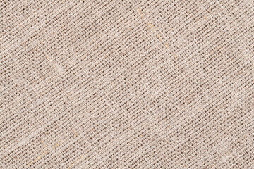 Linen crumpled texture natural fabric background closeup