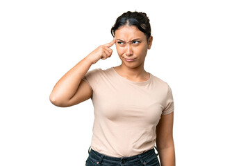 Young Uruguayan woman over isolated chroma key background making the gesture of madness putting...