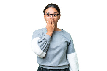 Young Uruguayan woman over isolated chroma key background covering mouth with hand