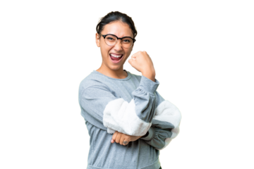 Young Uruguayan woman over isolated chroma key background celebrating a victory