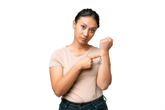 Young Uruguayan woman over isolated chroma key background making the gesture of being late