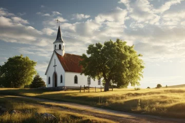Foto op Canvas Church in the meadow at sunset. Rural landscape with old church © Faith Stock