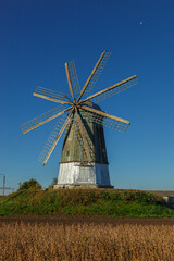 windmill dutch type against blue sky
