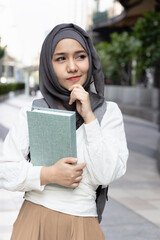 Education Ambitions, Ambitious smart Muslim College Female Student finding a good idea to Achievement