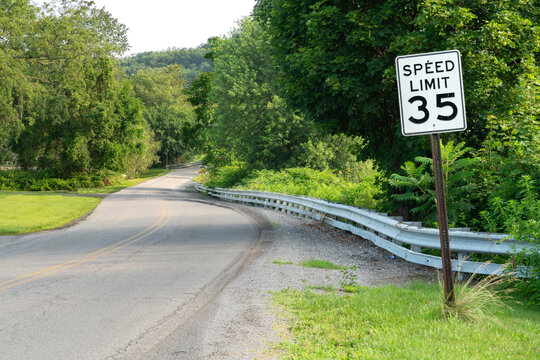Rural Road with Speed Limit Sign