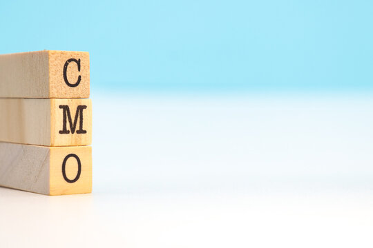 letters CMO written in cubes.
Chief Marketing Officer or business concept