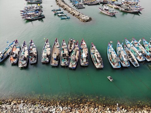 Aerial view of fishing boats in a harbour, Trenggalek, East Java Province, Indonesia