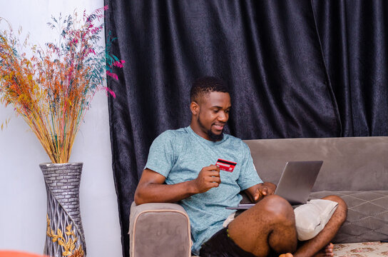 Businessman, Holding Mobile Phone And Credit Card For Online Shopping