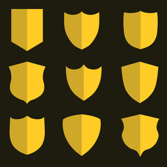Sets of yellow gold shields icon on black background