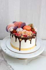 Souffle cake with sponge cake, melted chocolate and bright decorations
