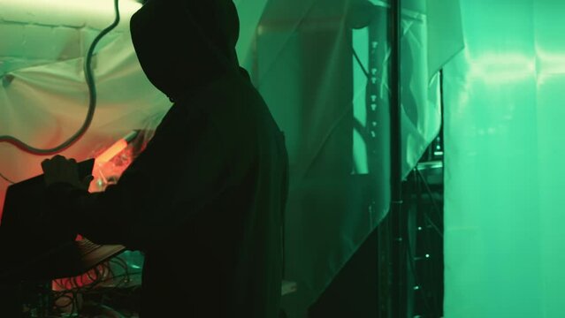 cyber security hacker in headquarter with laptop