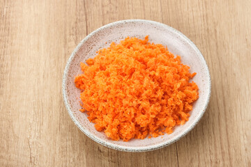 Organic carrots pulp juice, squeezed from a slow juicer, for face mask or processed into smoothie, zero waste.
