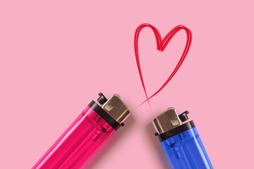 Pink and blue lighters with heart on pink background - Concept of love