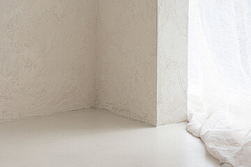 light beige painting background with light and shadow on wall.
