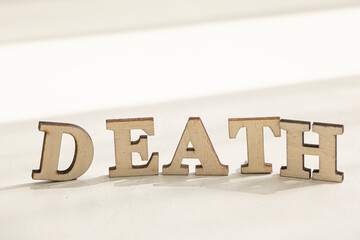 Fototapeta na wymiar DEATH text on ivory floor for your desing.