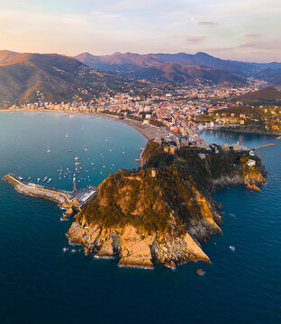 Aerial view of Sestri Levante and its Baia del Silenzio at sunset, Genova, Liguria