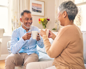 Obraz na płótnie Canvas Coffee, smile and a senior couple on a sofa in the home living room to relax while bonding in conversation. Love, retirement or marriage with a mature man and woman talking while drinking a beverage