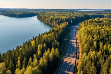 Foto op Aluminium Aerial view of highway and forest in Finland. Drone photography. © Graphicsstudio 5