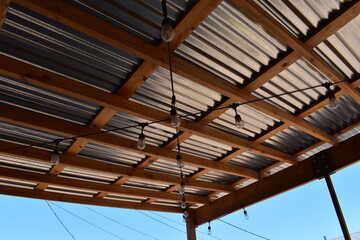 Metal and Wood Roof of Pergola with String Lights, Arizona Living