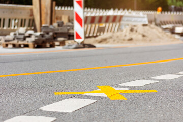 Road Closed with Yellow road Sign on Asphalt Path. Repair Road under Construction. Temporary Yellow...