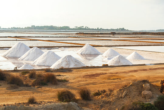 Piles of salt at salt flats, Saline Ettore e Infersa, Marsala, province of Trapani, Sicily
