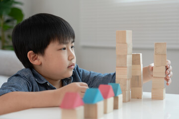 Happy Asia children play and learn toy blocks.family is happy and excited in the house. daughter...