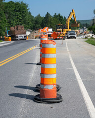Orange safey markers in a road construction site © Richard Nantais