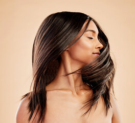 Woman, shaking hair and beauty with shine, growth and texture with natural cosmetics on studio...