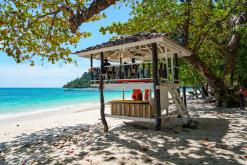 Lifeguard tower on a beautiful beach with turquoise transparent waters on Koh Rok island (Ko Rok Yai) in Mu Ko Lanta National Park in the Andaman Sea, Krabi Province, Thailand