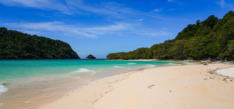 Beautiful beach with turquoise transparent waters on Koh Rok island (Ko Rok Yai) in Mu Ko Lanta National Park in the Andaman Sea, Krabi Province, Thailand