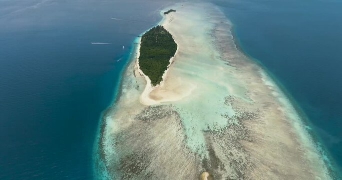 Atoll and tropical island Mataking with beach. Tun Sakaran Marine Park. Borneo, Sabah, Malaysia.
