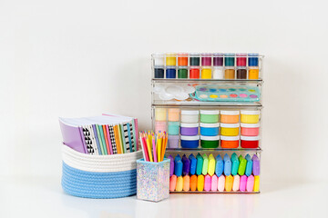 Paints, pencils, plasticine and various material for creativity and kids art activity in containers...