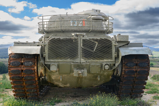 Close-up of the rear, of the butt, of an old tank, armored vehicle, military green, M60 patton of the American army in Europe and later of the Spanish army