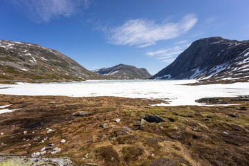 Fototapeta na wymiar Djupvatnet lake near Geiranger. Norway. Summer snow and ice